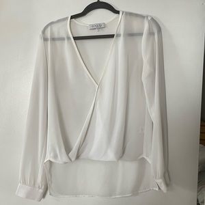 White sheer high low blouse